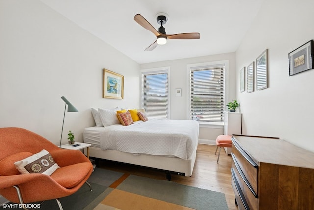 1219 W Lunt Ave Unit 1B, Chicago, IL 60626 - bedroom featuring light wood-style flooring and ceiling fan