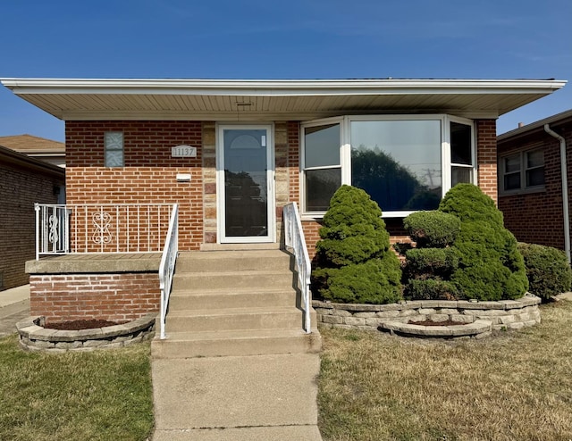 11137 S S Ave L, Chicago, IL 60617 - doorway to property with brick siding