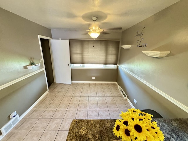 11137 S S Ave L, Chicago, IL 60617 - unfurnished dining area featuring ceiling fan and tile patterned flooring
