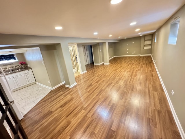 11137 S S Ave L, Chicago, IL 60617 - finished below grade area with light wood-type flooring and recessed lighting