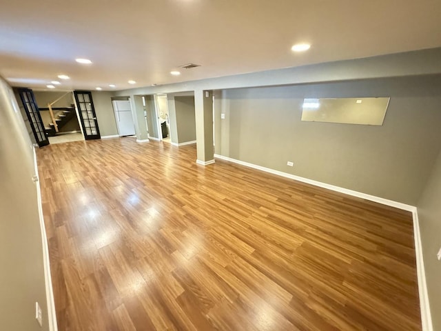 11137 S S Ave L, Chicago, IL 60617 - unfurnished living room featuring stairs, recessed lighting, and light wood finished floors