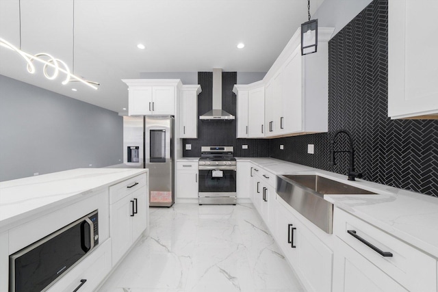 3628 S 54th Ct, Cicero, IL 60804 - kitchen featuring appliances with stainless steel finishes, wall chimney exhaust hood, backsplash, light stone counters, and recessed lighting
