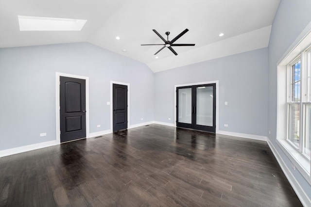 3628 S 54th Ct, Cicero, IL 60804 - unfurnished living room featuring ceiling fan, french doors, dark wood finished floors, a skylight, and high vaulted ceiling