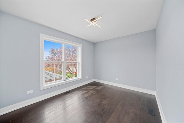 3628 S 54th Ct, Cicero, IL 60804 - unfurnished room with dark wood-style floors and baseboards