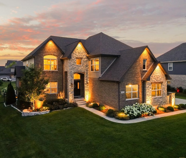 13052 Dunmoor Dr, Lemont, IL 60439 - view of front of home with stone siding, a lawn, and brick siding