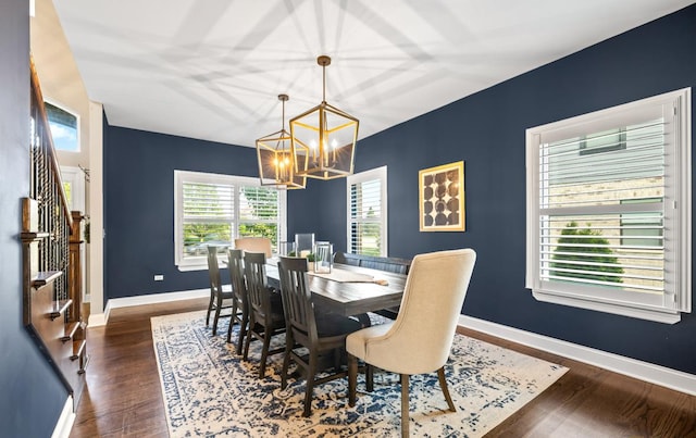 13052 Dunmoor Dr, Lemont, IL 60439 - dining room with a chandelier, wood finished floors, and stairway