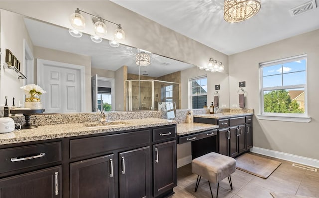 13052 Dunmoor Dr, Lemont, IL 60439 - full bathroom featuring a stall shower, tile patterned floors, and vanity