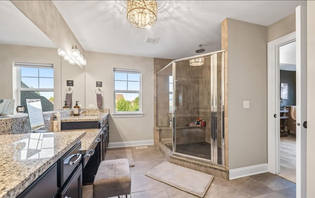 13052 Dunmoor Dr, Lemont, IL 60439 - bathroom with vanity, healthy amount of natural light, a shower stall, and tile patterned flooring