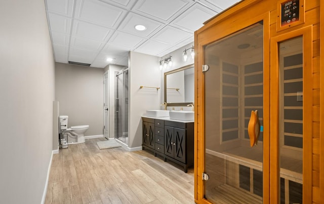 13052 Dunmoor Dr, Lemont, IL 60439 - bathroom with a sauna / steam room, vanity, a shower stall, wood finished floors, and recessed lighting