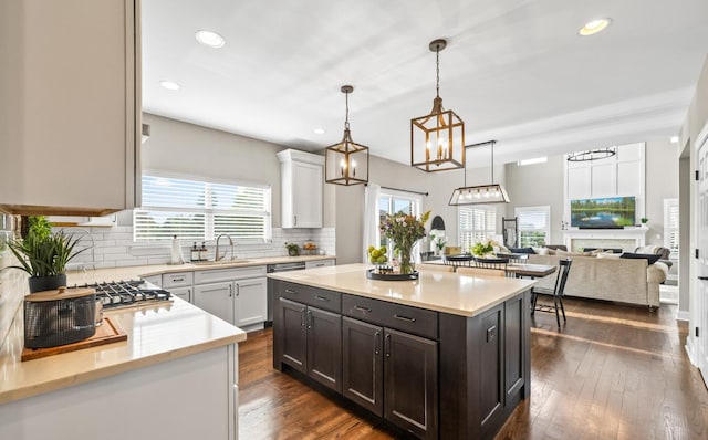 13052 Dunmoor Dr, Lemont, IL 60439 - kitchen featuring stainless steel appliances, backsplash, healthy amount of natural light, recessed lighting, and white cabinets