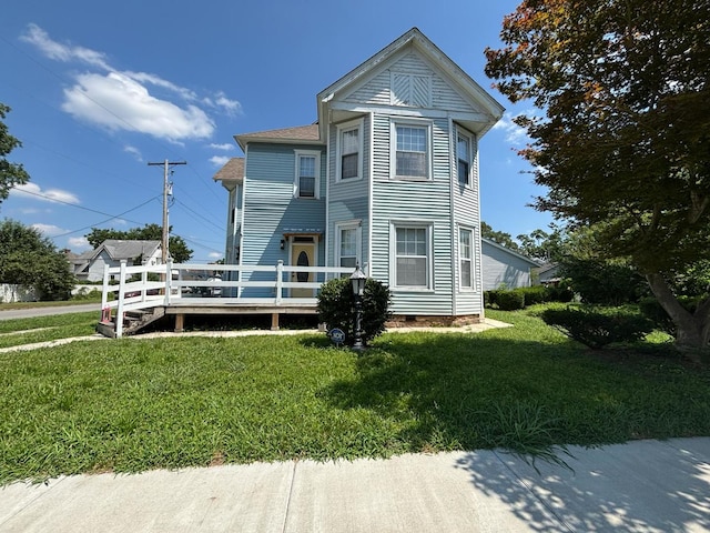 1844 Spruce St, Murphysboro, IL 62966 - view of front of property featuring a deck, a front lawn, and crawl space