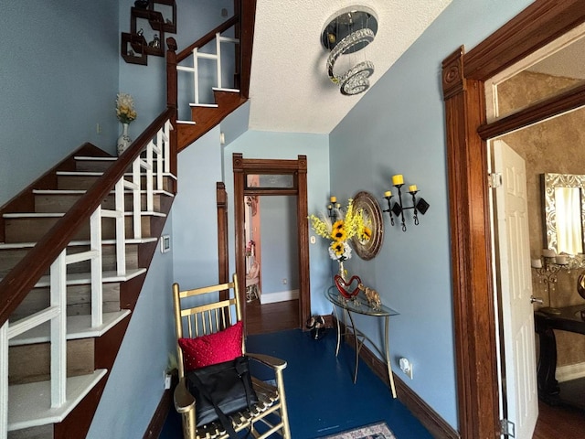 1844 Spruce St, Murphysboro, IL 62966 - staircase with baseboards and a textured ceiling