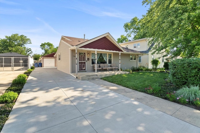 7306 W 115th St, Worth, IL 60482 - view of front of property featuring a garage, driveway, a front yard, and a porch