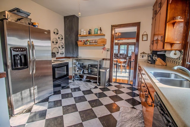 524 E 13th St, Lockport, IL 60441 - kitchen featuring black appliances, light countertops, and open shelves