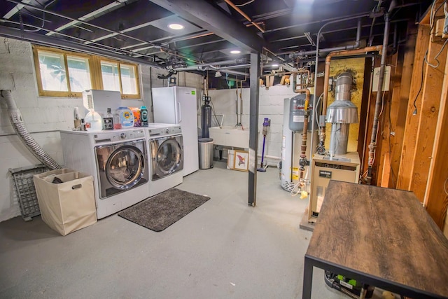 524 E 13th St, Lockport, IL 60441 - below grade area featuring washing machine and dryer, a heating unit, and fridge
