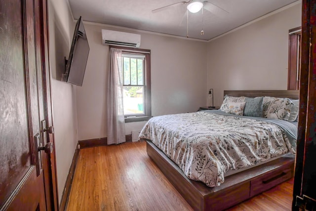 524 E 13th St, Lockport, IL 60441 - bedroom featuring a wall mounted air conditioner, wood finished floors, crown molding, and ceiling fan