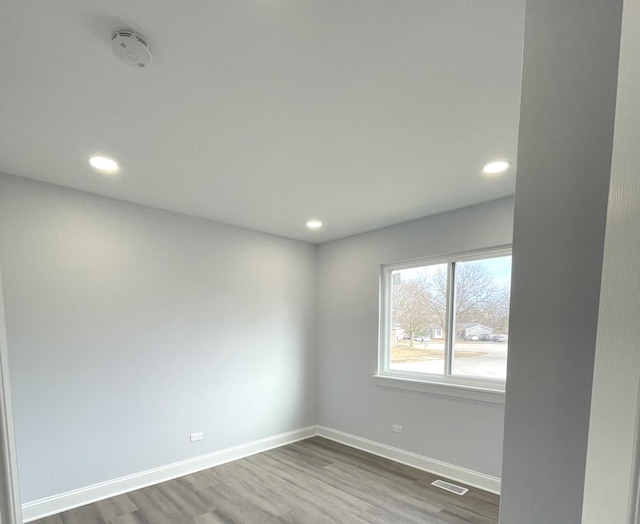 2100 Lloyd Ave, Lombard, IL 60148 - unfurnished room featuring a smoke detector, recessed lighting, and wood finished floors