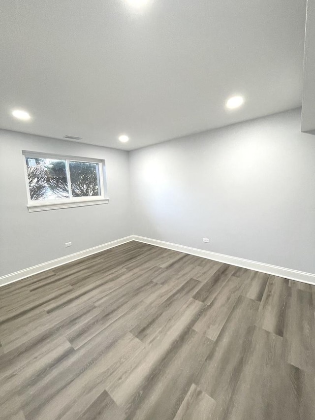 2100 Lloyd Ave, Lombard, IL 60148 - spare room featuring dark wood-type flooring and recessed lighting