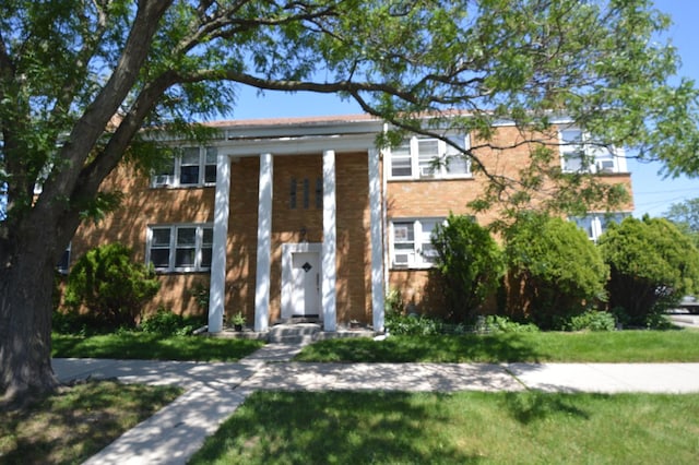7921 Niles Ave, Skokie, IL 60077 - greek revival house featuring brick siding