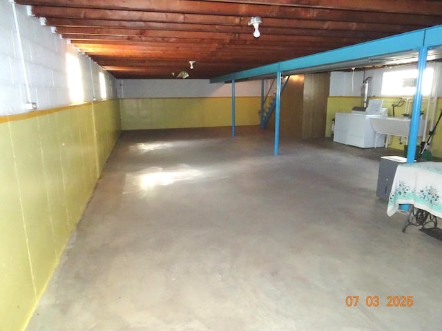 475 Courtesy Ln, Des Plaines, IL 60018 - basement featuring washing machine and clothes dryer and a sink
