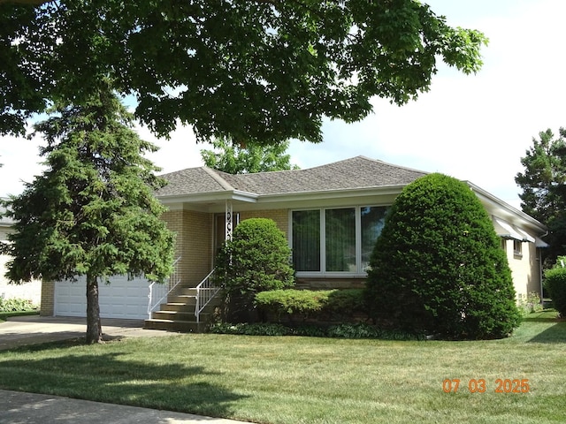 475 Courtesy Ln, Des Plaines, IL 60018 - view of front of property with brick siding, a front yard, driveway, and roof with shingles