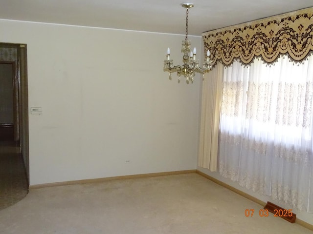 475 Courtesy Ln, Des Plaines, IL 60018 - unfurnished room with carpet flooring and a chandelier