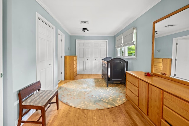 3717 W High St, Mchenry, IL 60050 - foyer with light wood-type flooring, ornamental molding, and wainscoting