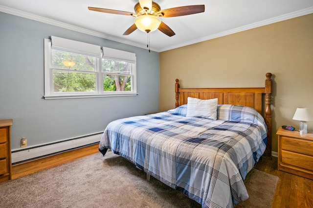 3717 W High St, Mchenry, IL 60050 - bedroom with a baseboard heating unit, wood finished floors, crown molding, and a ceiling fan