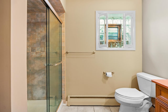 3717 W High St, Mchenry, IL 60050 - bathroom featuring baseboard heating, a stall shower, vanity, and tile patterned flooring
