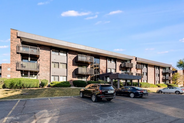 1503 Woodbridge Rd Unit 3E, Joliet, IL 60436 - view of apartment building / complex with uncovered parking