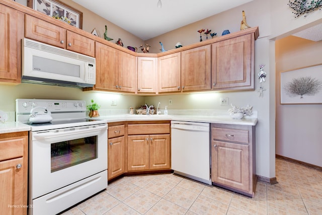1503 Woodbridge Rd Unit 3E, Joliet, IL 60436 - kitchen with white appliances, light tile patterned flooring, and light countertops