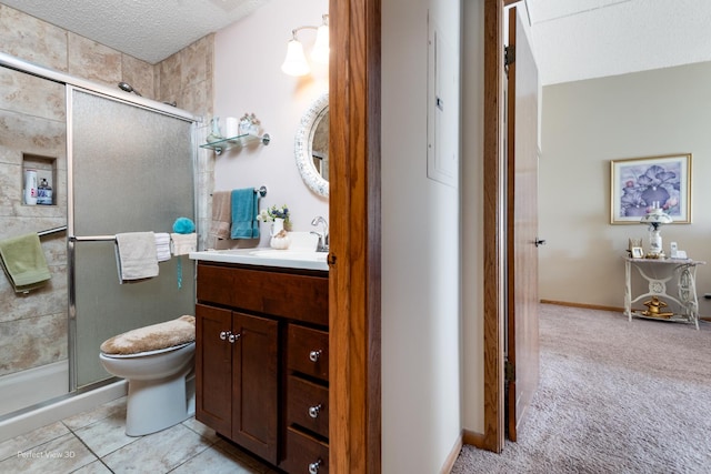 1503 Woodbridge Rd Unit 3E, Joliet, IL 60436 - bathroom featuring vanity, a shower stall, and a textured ceiling