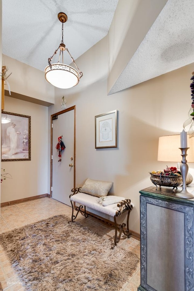1503 Woodbridge Rd Unit 3E, Joliet, IL 60436 - foyer entrance with tile patterned floors and a textured ceiling