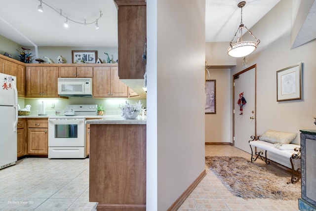 1503 Woodbridge Rd Unit 3E, Joliet, IL 60436 - kitchen with white appliances, light countertops, light tile patterned floors, and pendant lighting