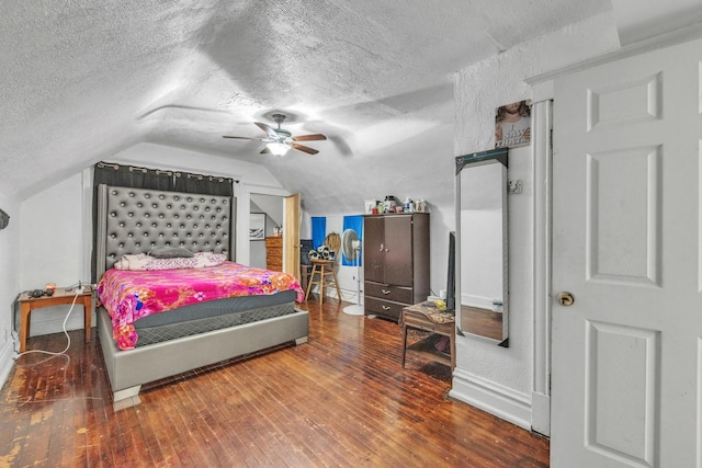 3031 S Central Park Ave, Chicago, IL 60623 - bedroom with a textured ceiling, wood-type flooring, vaulted ceiling, and ceiling fan