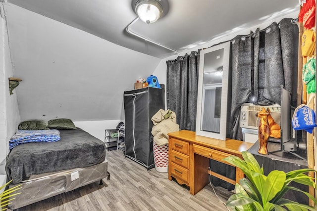 3031 S Central Park Ave, Chicago, IL 60623 - bedroom featuring wood finished floors and vaulted ceiling