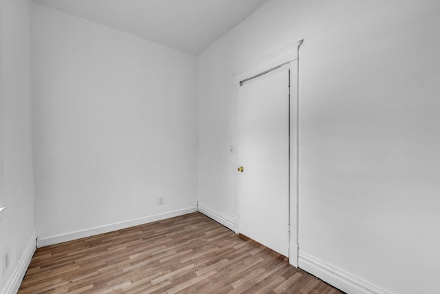3031 S Central Park Ave, Chicago, IL 60623 - unfurnished room featuring light wood-type flooring and baseboards