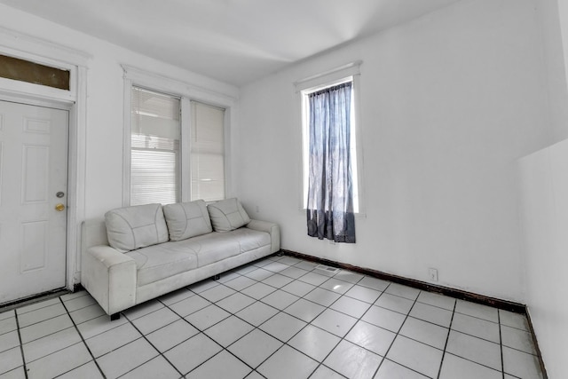3031 S Central Park Ave, Chicago, IL 60623 - living area featuring light tile patterned floors and baseboards