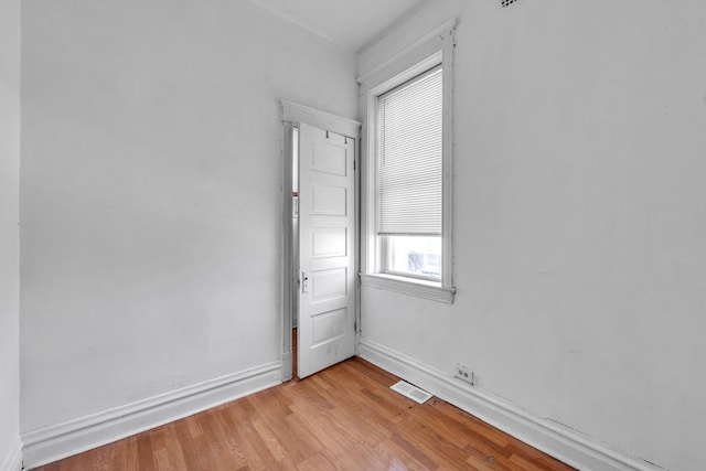 3031 S Central Park Ave, Chicago, IL 60623 - unfurnished room featuring light wood-style floors and baseboards