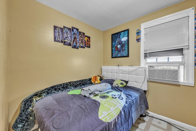 3031 S Central Park Ave, Chicago, IL 60623 - bedroom with tile patterned floors and cooling unit