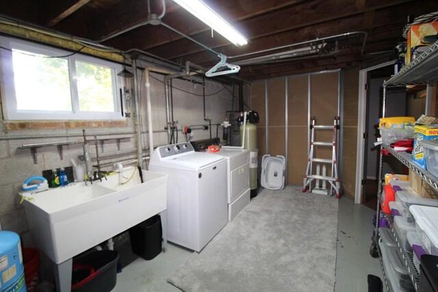 1906 Green Bay Rd, Zion, IL 60099 - below grade area featuring separate washer and dryer and water heater