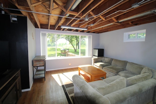 1906 Green Bay Rd, Zion, IL 60099 - living room featuring dark wood-style floors and baseboards