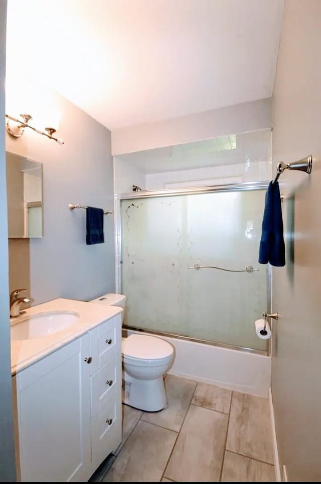 1906 Green Bay Rd, Zion, IL 60099 - bathroom featuring vanity and enclosed tub / shower combo