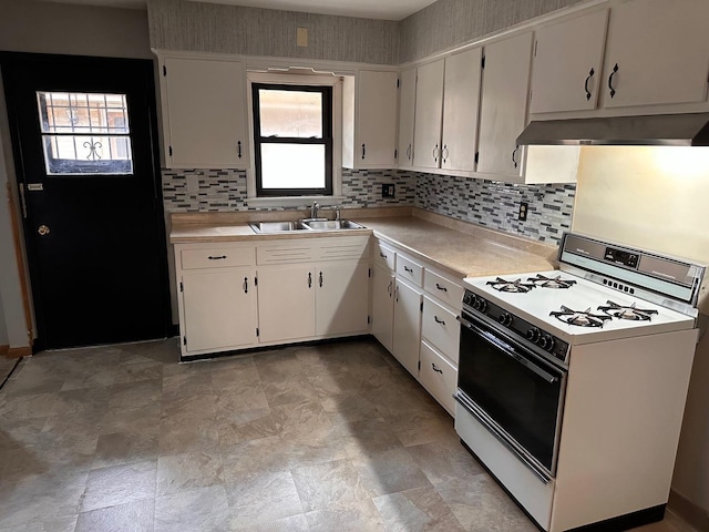 501 Fairview Ave, Rockford, IL 61108 - kitchen featuring white gas range oven, ventilation hood, light countertops, and backsplash