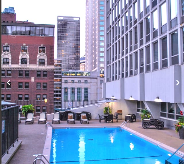 111 E Chestnut St Unit 4400J, Chicago, IL 60611 - community pool featuring a patio area and a view of city