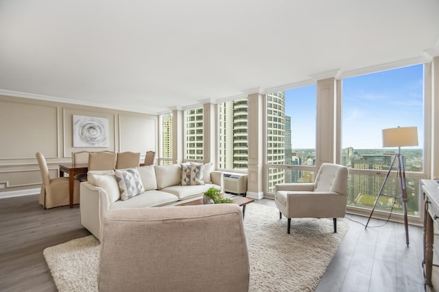 111 E Chestnut St Unit 4400J, Chicago, IL 60611 - living area with floor to ceiling windows, healthy amount of natural light, light wood-type flooring, and a decorative wall