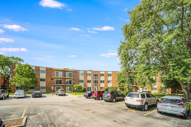 9716 S Karlov Ave S Unit 307, Oak Lawn, IL 60453 - view of property featuring uncovered parking