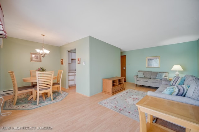9716 S Karlov Ave S Unit 307, Oak Lawn, IL 60453 - living room featuring baseboard heating, a chandelier, and wood finished floors