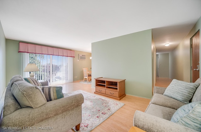 9716 S Karlov Ave S Unit 307, Oak Lawn, IL 60453 - living room featuring wood finished floors and a wall unit AC