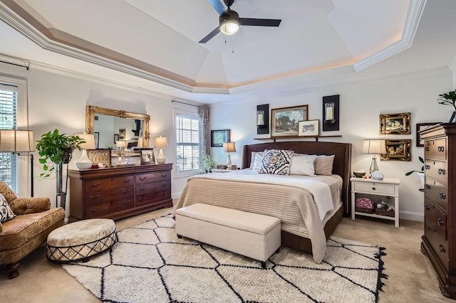 12740 Hawks Bill Ln, Plainfield, IL 60585 - bedroom featuring a raised ceiling, light colored carpet, multiple windows, and crown molding